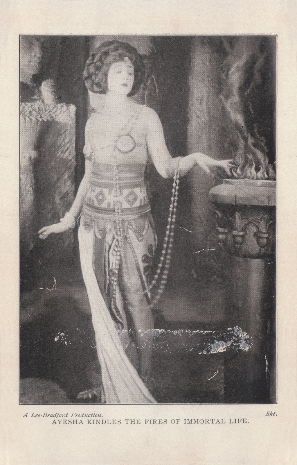 Ayesha kindles the fires of immortal life. Ayeshakindlesfrontispiece