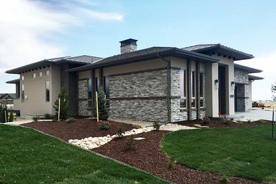 prairie style house plan ideal for a gently sloping lot - 64424sc prairie style house plan ideal for a gently sloping lot - 64424sc