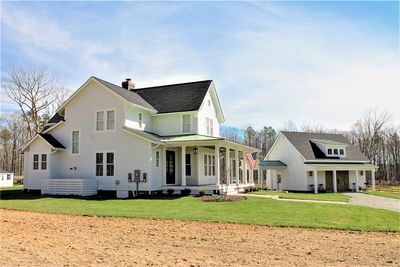 Quintessential American Farmhouse with Detached Garage and Quintessential American Farmhouse with Detached Garage and