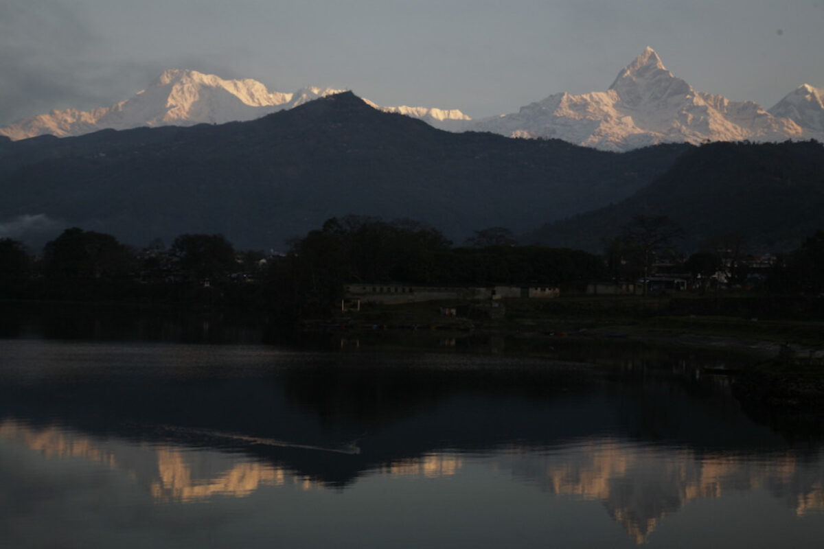 Fly to Kathmandu via Pokhara and depart