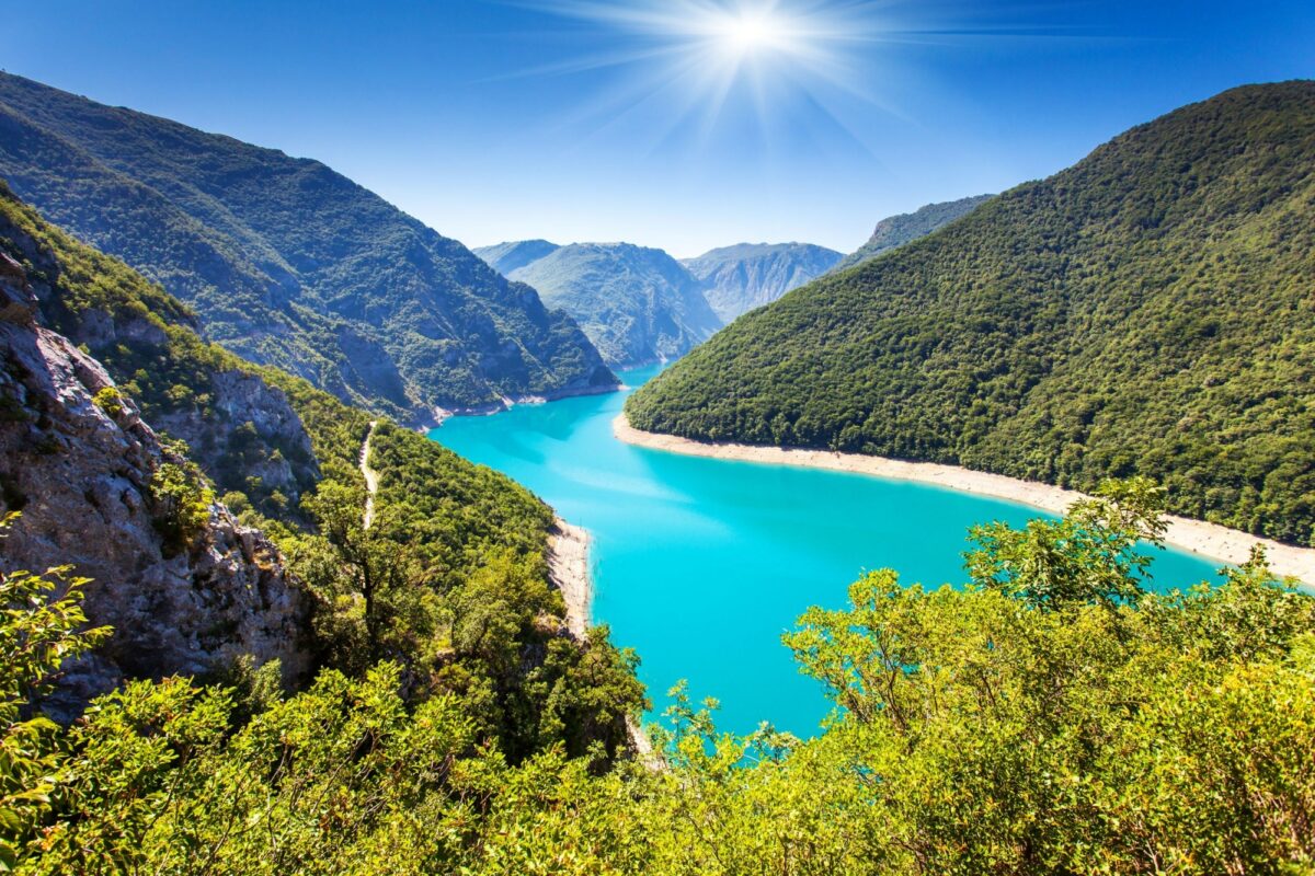 Enjoy the deep blue water of Lake Piva