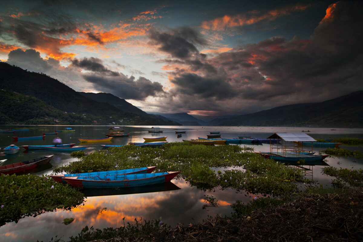 Fly to Kathmandu via Pokhara and depart