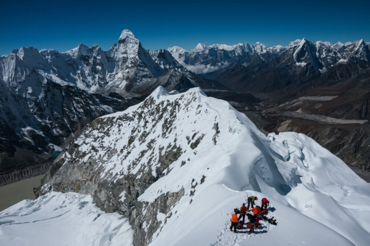 Hiker on Himalayas view from Island Peak trek Nepal