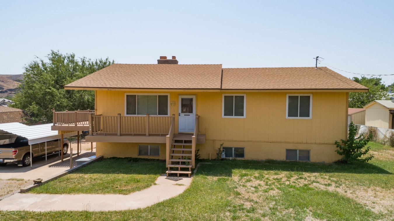 27483 Home on nearly a half acre with pressurized irrigation. Kitchen was remodeled in 2009. Nice deck off kitchen with TREX wood. Pantry and side by side refrigerator stays, as well as the 40