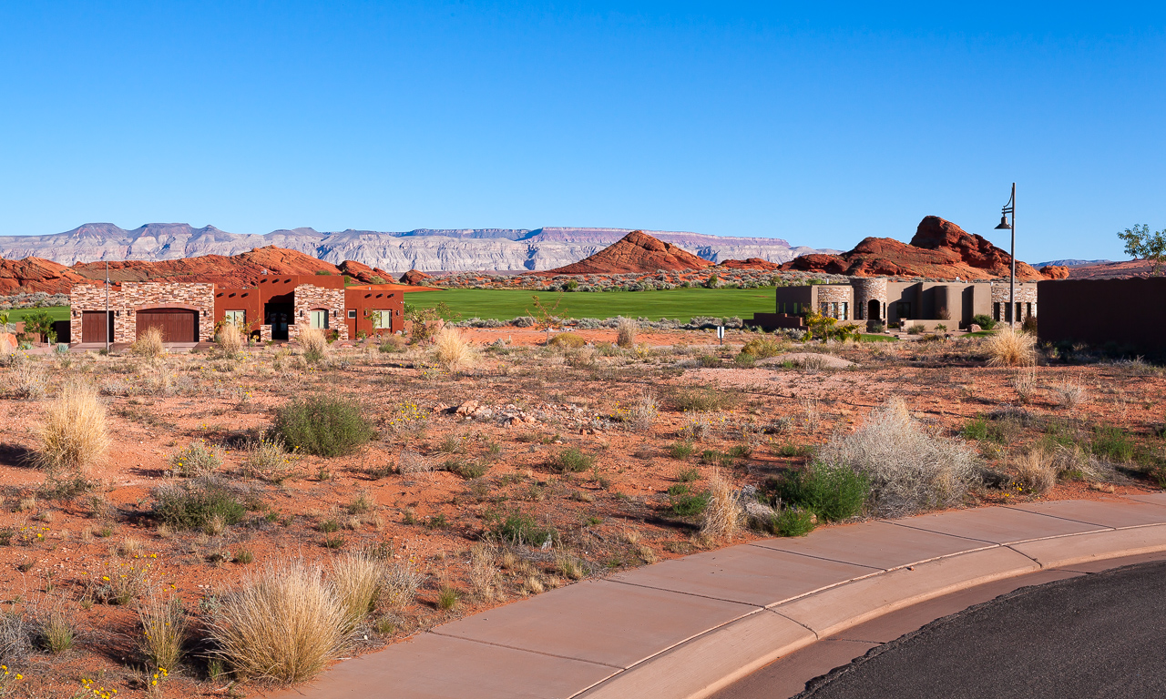 27814 Beautiful lot in The Dunes at Sand Hollow. Amazing views of the red rocks and the golf course. Water conservancy fees have been paid!