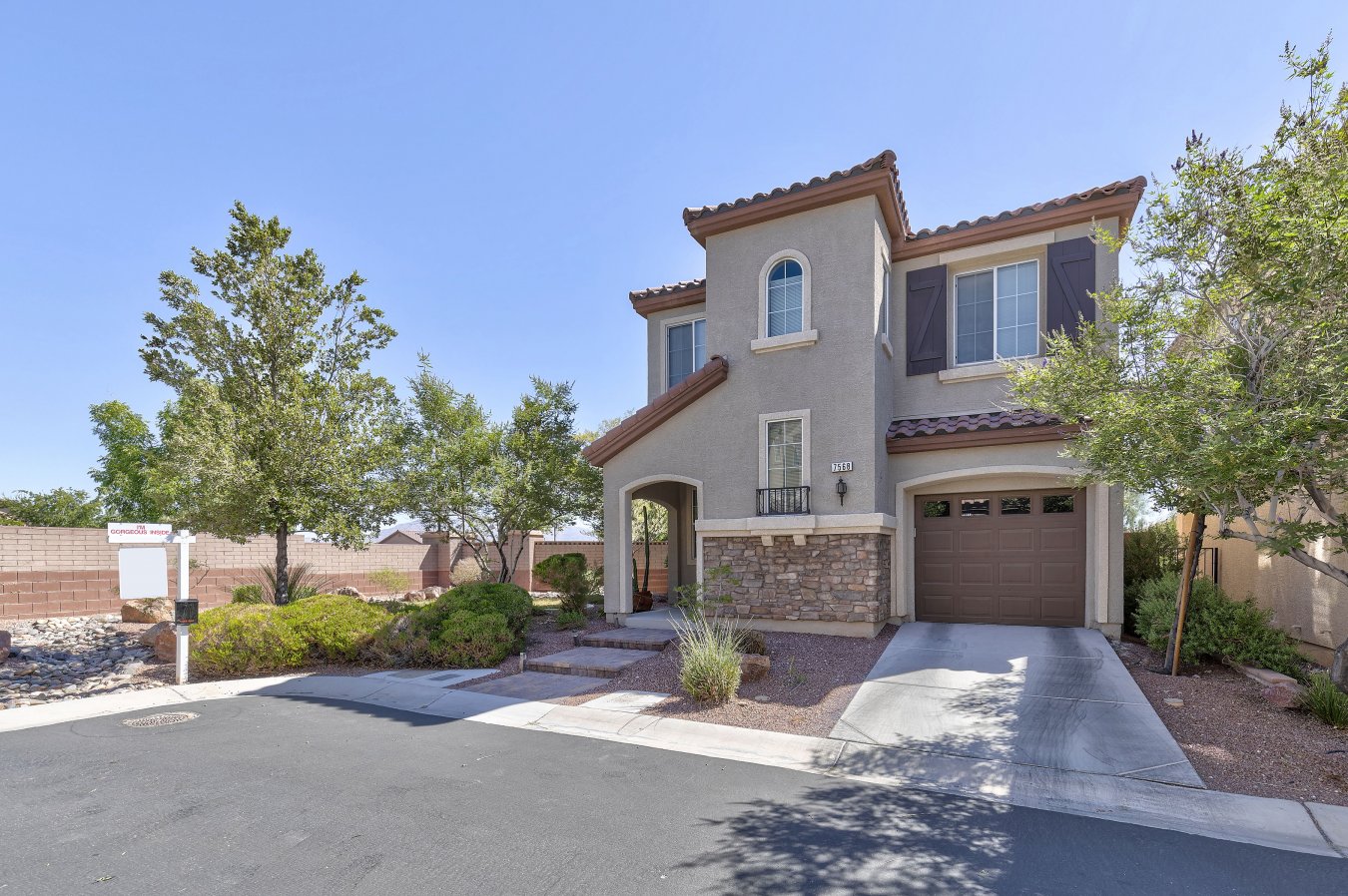 28064 Former model on an over-sized lot in the cul-de-sac. Beautifully maintained inside & out. Desert friendly landscaping. Built-in entertainment center in living room. Covered patio to help keep you cooler. Plantation shutters abound. Stainless steel appliances with side-by-side refrigerator add to the sleek look in the kitchen. Granite counter tops. Additional storage cabinets in garage. Compare this price to new homes in the neighborhood.