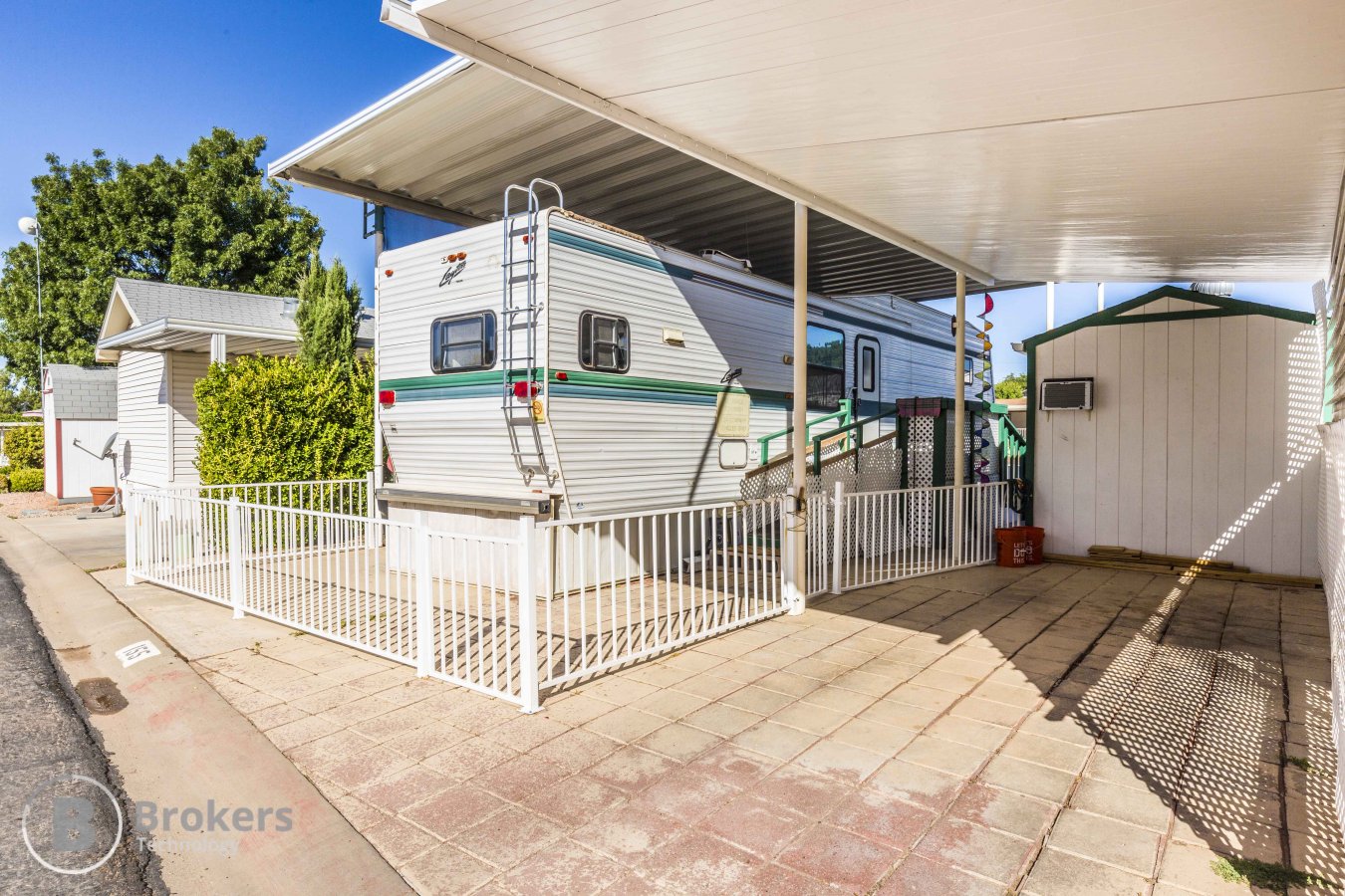 Come enjoy the beautiful weather Southern Utah has to offer from your 136 sqft patio! You'll love this 1996 Layton Deluxe Skyline w/2 Pop-outs! Located in 55+ community this 1 BD/1BA roomy unit has new bathroom flooring, lots of light in the kitchen, full size fridge! Patio cover ensures you can enjoy your porch in the shade. 80 SqFt workshop w/ 2' drain & 220V power. Stackable washer and dryer included! Call or text Beverly at ERA: 435-705-1857
