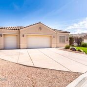 28798 Look no further! This Vista Del Monte Open Floor Plan Model Home with a 3 Car Garage can be yours. Your new home has only one neighbor on the west side and is located on a Golf Course. The breathtaking Sunrise and Sunsets can be seen from both patios that are North and East facing. Here in Mesquite having the patio facing North is a BONUS!! No direct sun on those summer afternoons. This spectacular home belongs to the Mesquite Vistas Sports Club where you may enjoy a workout in the Gym, a swim in the Pool or Jacuzzi. If that's not enough you can play Pickle ball, Tennis, Basketball or Horseshoes not to mention you may also get lunch served to you at the pool!!! Seller is also offering a One Year Home warranty up to $560.00.