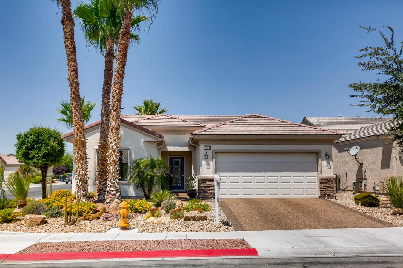 19712 Absolutely Stunning Sun City Aliante Cedar model. Pebble Stone Driveway & Walkway. Corner lot. Backyard features: Covered patio & Slump stone walls, Custom Entry, 21 inch ceramic tile threw out living area, Bedrooms carpeted, 3 Solar Tube skylights. Granite kitchen counter tops with custom backsplashes, Top of the line Stainless Steel Appliances. Under counter lighting. Sunburst Shutters T/O. pre wired alarm