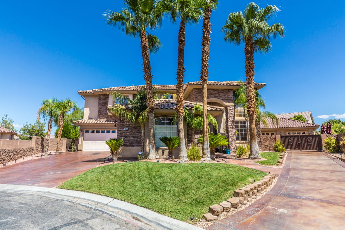 21201 Entertainers Paradise! One of the biggest lots,half acre in the cul-de-sac.Family room with wet bar,wine cellar room,butler's pantry in the kitchen with custom ceilings.Large master with balcony.Courtyard features marble fountain,chairs, table.Backyard features 2 Palapas with BBQ grill,fridge and Fire pit.putting green,outdoor shower,pool /waterfall/spa,covered patio with misters.Brand new A/Cs,6 car garage with automatic gate and so much more...
