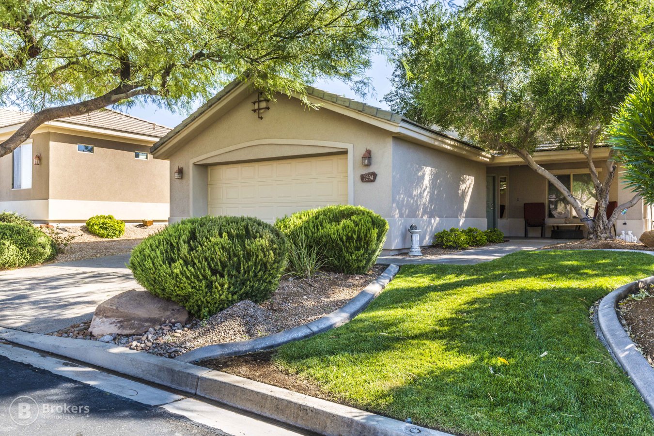 21683 How would you like to wake up to a beautiful golf course view? This home is located on the Canyons Golf Course. The patio on this home is east facing with beautiful views of the mountains and golf course. The kitchen has granite counter tops. The flooring is a unique stained concrete with partial carpet in the living room and bedrooms. The garden area has been recently upgraded. Also the A/C compressor was just changed in August 2017. A short drive will take you to the Mesquite Vistas Sports Club where you can enjoy the pool, Jacuzzi, weight-room, pickle ball, tennis and basket ball courts.