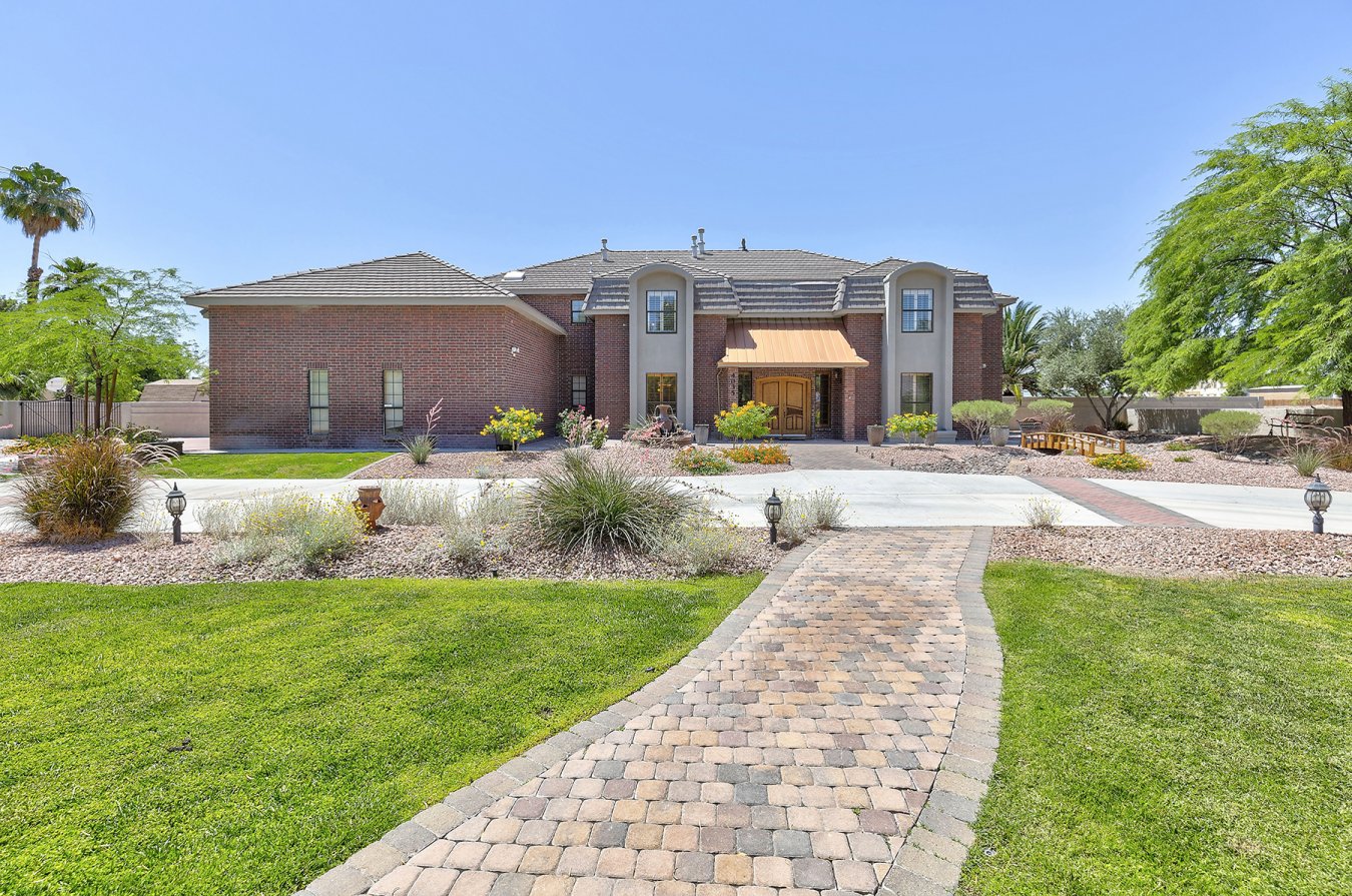 24137 BEST BUY! PRICE REDUCED!! large custom on over 2 acres, lots of potential opportunities, additional acreage that could be built on or subdivided & sold separately. Open floor plan with a beautiful Great room with bar, high vaulted ceilings. Too many amenities to mention. extreme pride of ownership. beautiful tranquil back yard with pool & spa, gazebo, balcony, large covered patio approx. 80x13. Entertainers delight. Room for all RV and toys.