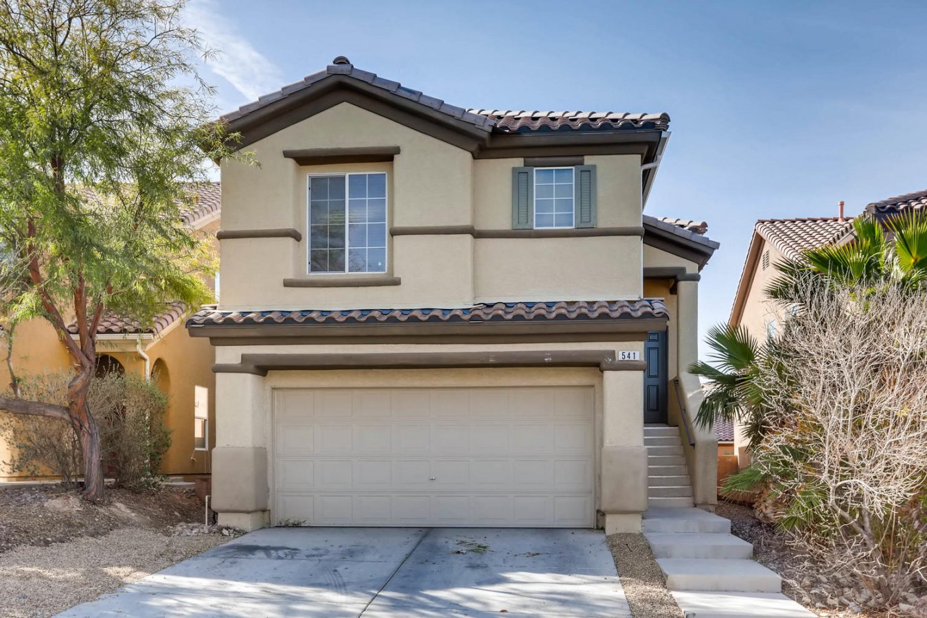 24271 Great 4 Bedroom 2.5 Bathroom Home! Entrance brings you in on large landing of staircase, with kitchen, master bedroom/bathroom, living/dining area & 1/2 bathroom on 2nd floor if you go up and three bedrooms, full bathroom, laundry room and large play area/family room on 1st floor. Covered patio off of first floor family room and balcony off second story with great views of mountains. Entire house has been re-done and landscaping updated. Must see