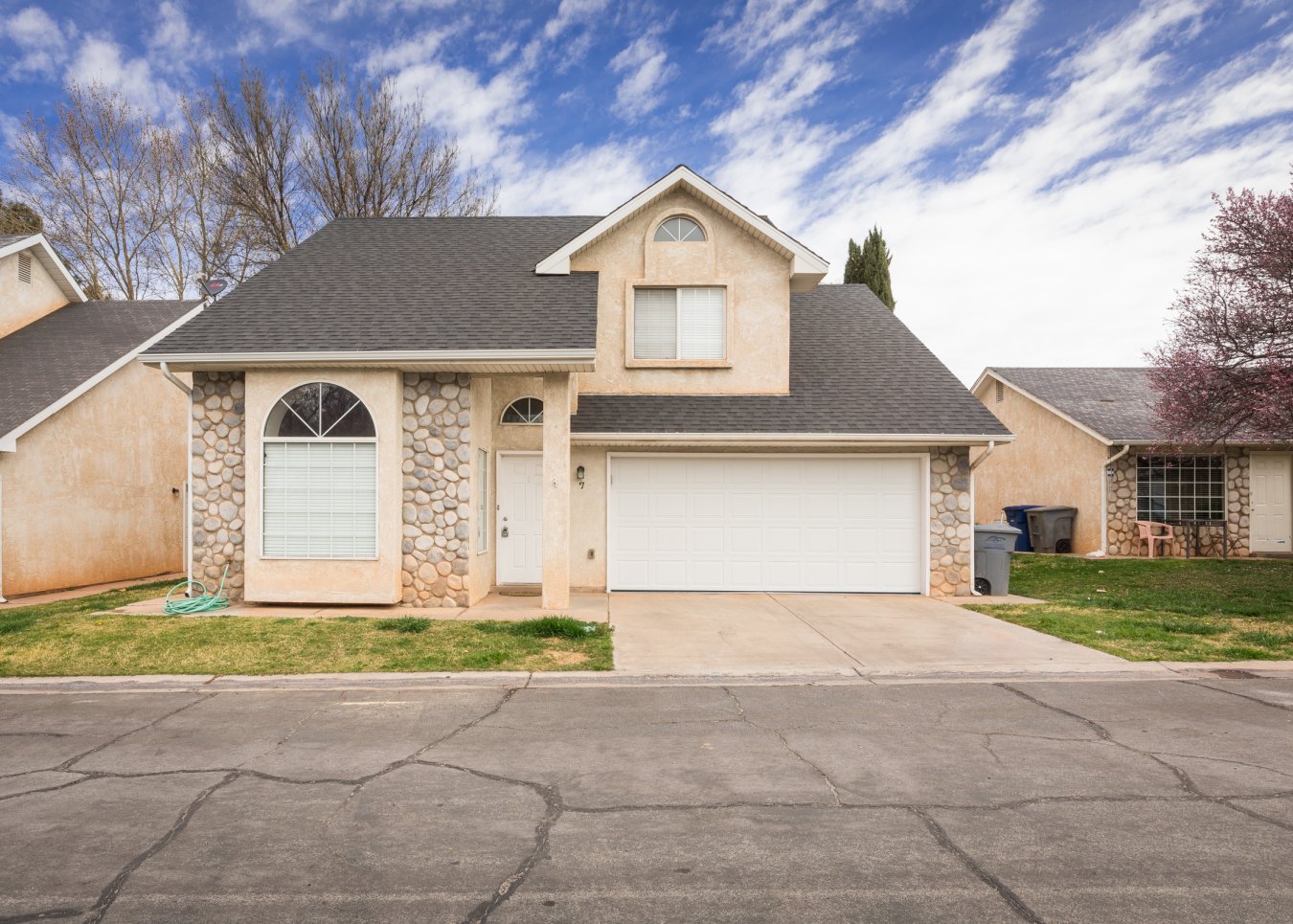25125 Spacious floor plan with 2 bedrooms on main level. Large Loft provides extra room for TV, entertaining, play area. New paint, clean and ready for a new owner!