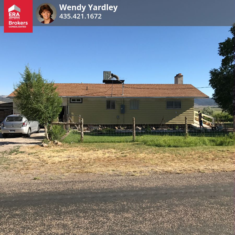 25458 This charming home features a large country kitchen/dining room with an awesome view! It also features 3 bedrooms (with the potential for 2 more). 2 full baths, family room, attached garage, 2 large storage rooms, large pasture with irrigation water, a fun fire pit area with a huge yard and tons of room!