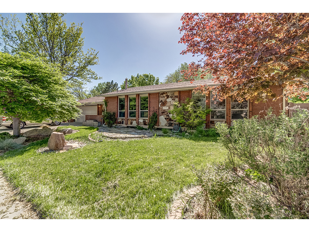 25890 Almost 1.5 acres in Draper! This hidden gem is well built and features an updated granite kitchen and a large deck to spend your summer evenings enjoying the unobstructed views of the Jordan River Valley and Oquirrah Mountains. A perfect gentleman's farm, this home is set back from the road and is landscaped with mature trees, a working barn, and plenty of land which is fully fenced! A conditional use permit is approved through Draper City and it follows the land. 5 irrigation shares included.