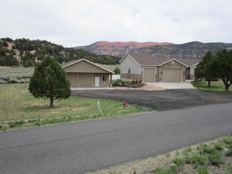 26479 This Beautiful Mountain Home is within a 2-1/2 hour drive of 5 National Parks, the North Rim of the Grand Canyon, Lake Powell Recreational Area, just to start, and much more. Located in Garfield County, which has a New Medical Clinic in Panguitch, Utah. Approx. 12 miles to the North on HWY 89. Cedar City and Southern State University is within an hour drive, over HWY 14 to the West... There are many lakes and fishing streams in the county area, for your pleasure, to enjoy. There are designated trails for mountain bikes, horses, ATV's and hiking... Hunting is less than 30 min. away, in any direction. There are good restaurants in Panguitch, Hatch, along HWY 12, East, and elsewhere.There are church's of various denominations in the area to choose from.