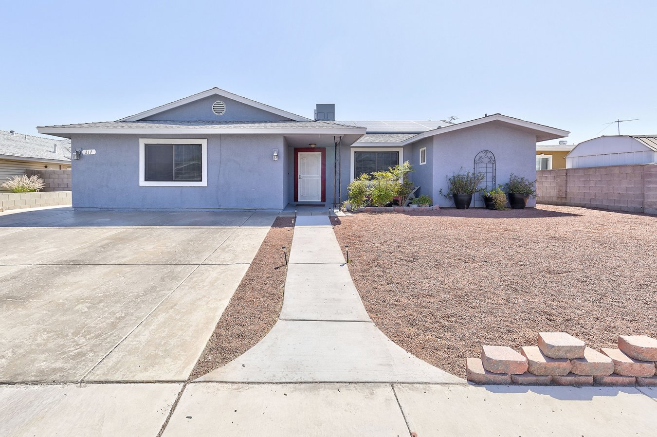 27726 This Spacious home is Close to Schools, Shopping/Freeways. NO HOA! But, there's a GREAT Pool, 4 Bedrooms and 4 Bath Rms. Stunning Tile flooring and a Huge Gorgeous Double Fireplace that divides the Living & Dining Rms. The Kitchen features Solid Surface C-Tops, Great Cabinets and an extra Storage rm. Also, Blinds & C-Fans, Low energy windows & Solar Tubes for excellent lighting. Solar Power system is from Tesla, buyers must assume lease.