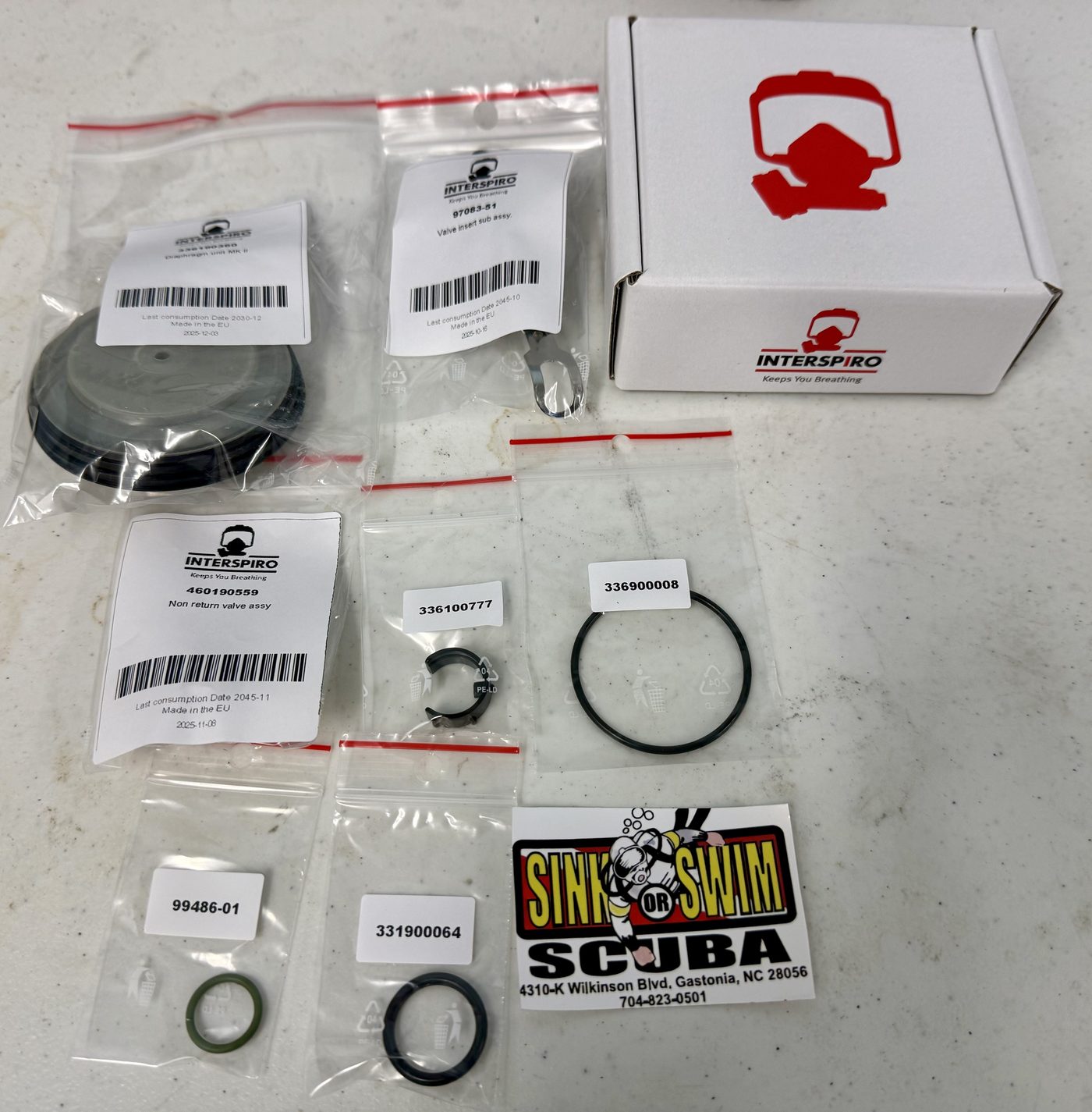 Genuine Interspiro service parts - diaphragm unit, valve insert and non-return valve assembly - at Sink or Swim Scuba in Gastonia, NC