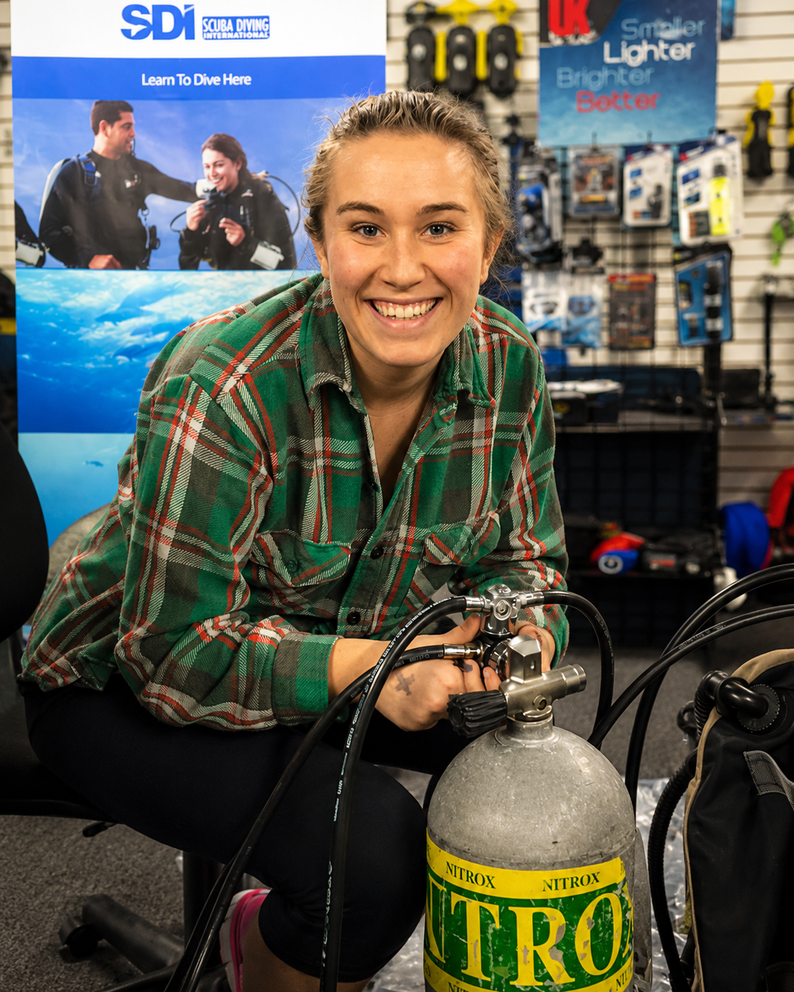 Diver working with a Nitrox scuba cylinder at Sink or Swim Scuba in Gastonia, NC.