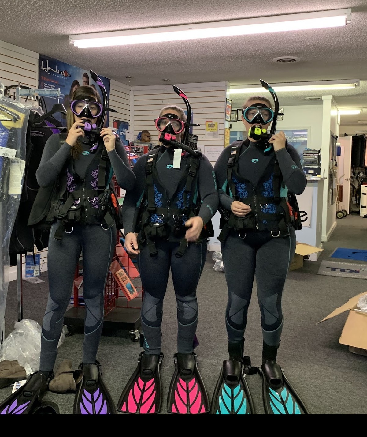 Diver trying on scuba gear at Sink or Swim Scuba near Charlotte NC