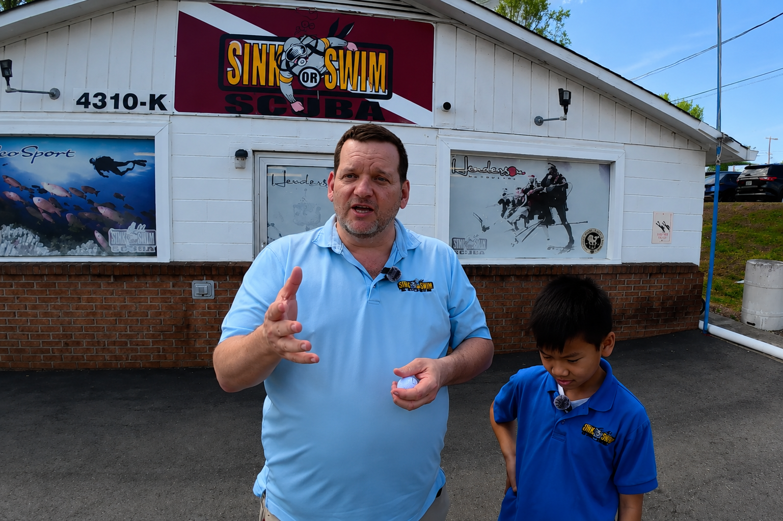 Brent Clevenger and Dylan outside Sink or Swim Scuba in Gastonia NC serving Charlotte area scuba divers and public safety dive teams
