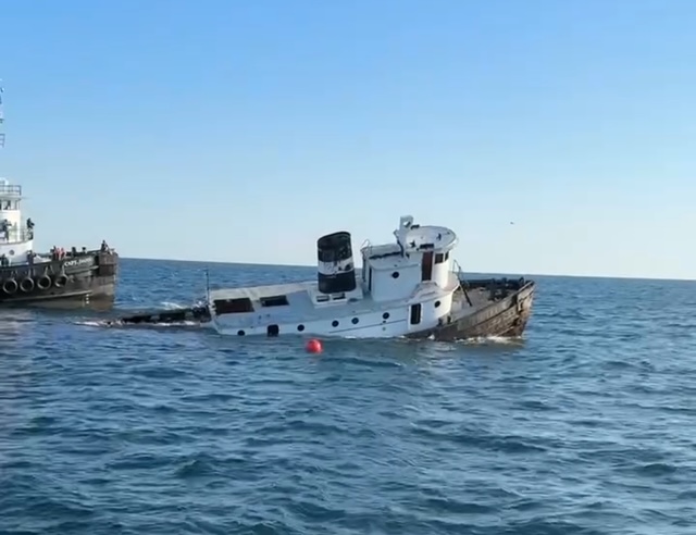 The Hornblower tug while being deployed as a dive site.