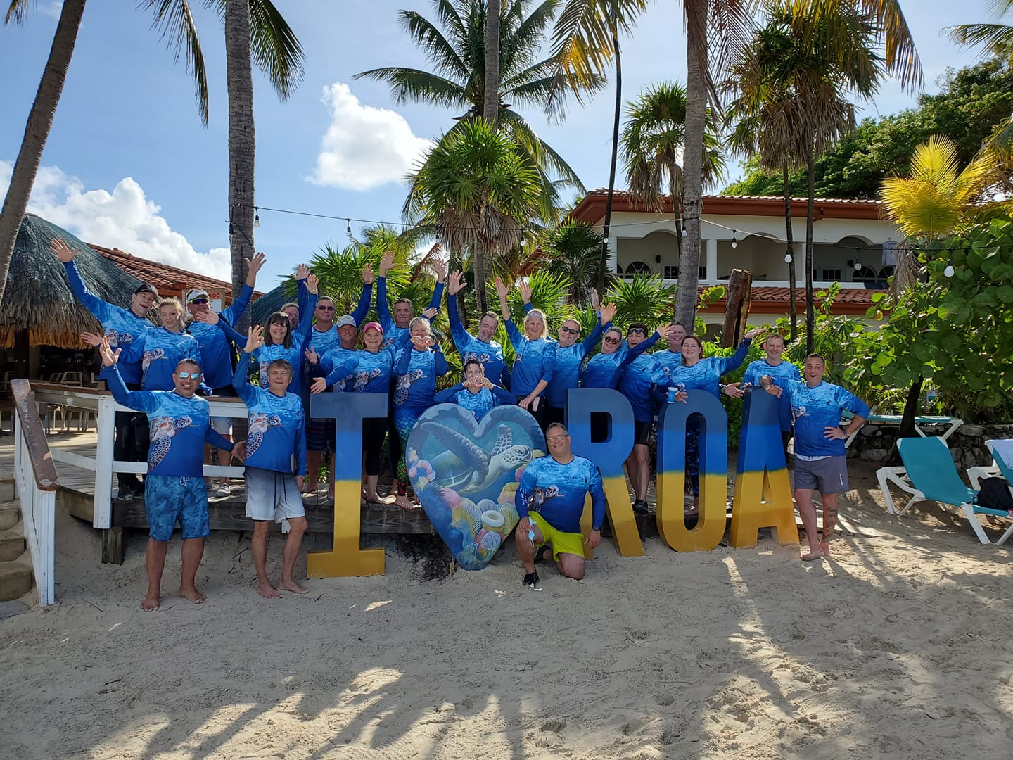 Dive & Glide Scuba group travelers on a tropical dive trip