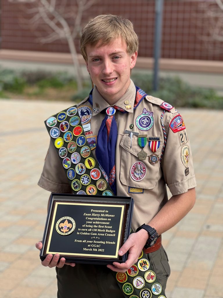 Image of Scout with Merit Badges