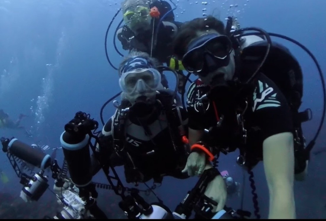 Two Dive Arizona divers underwater together on a guided group dive