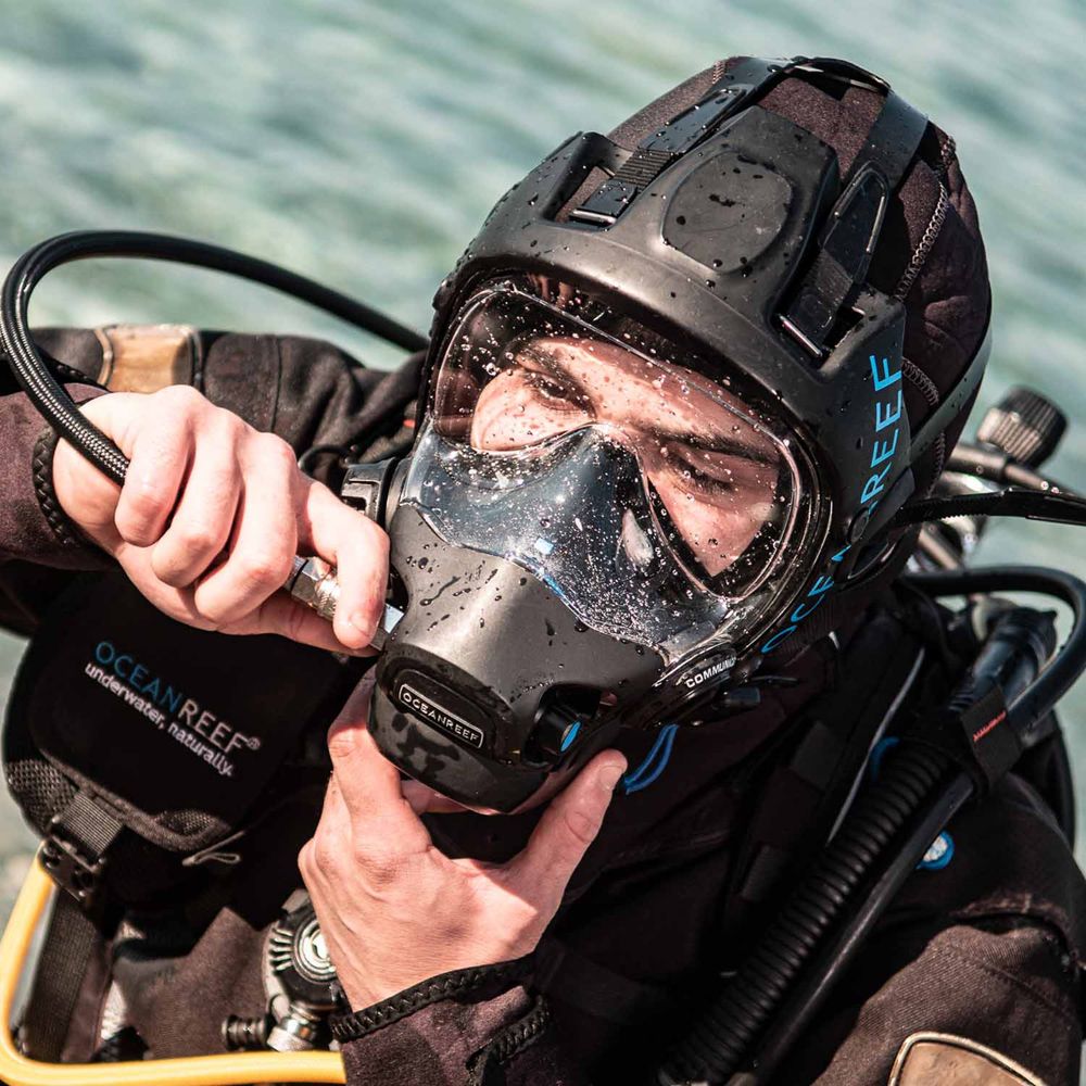 Diver at the surface wearing an Ocean Reef Neptune III full face mask