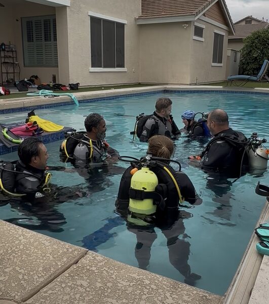 SDI scuba class practicing skills in a pool at Dive Arizona
