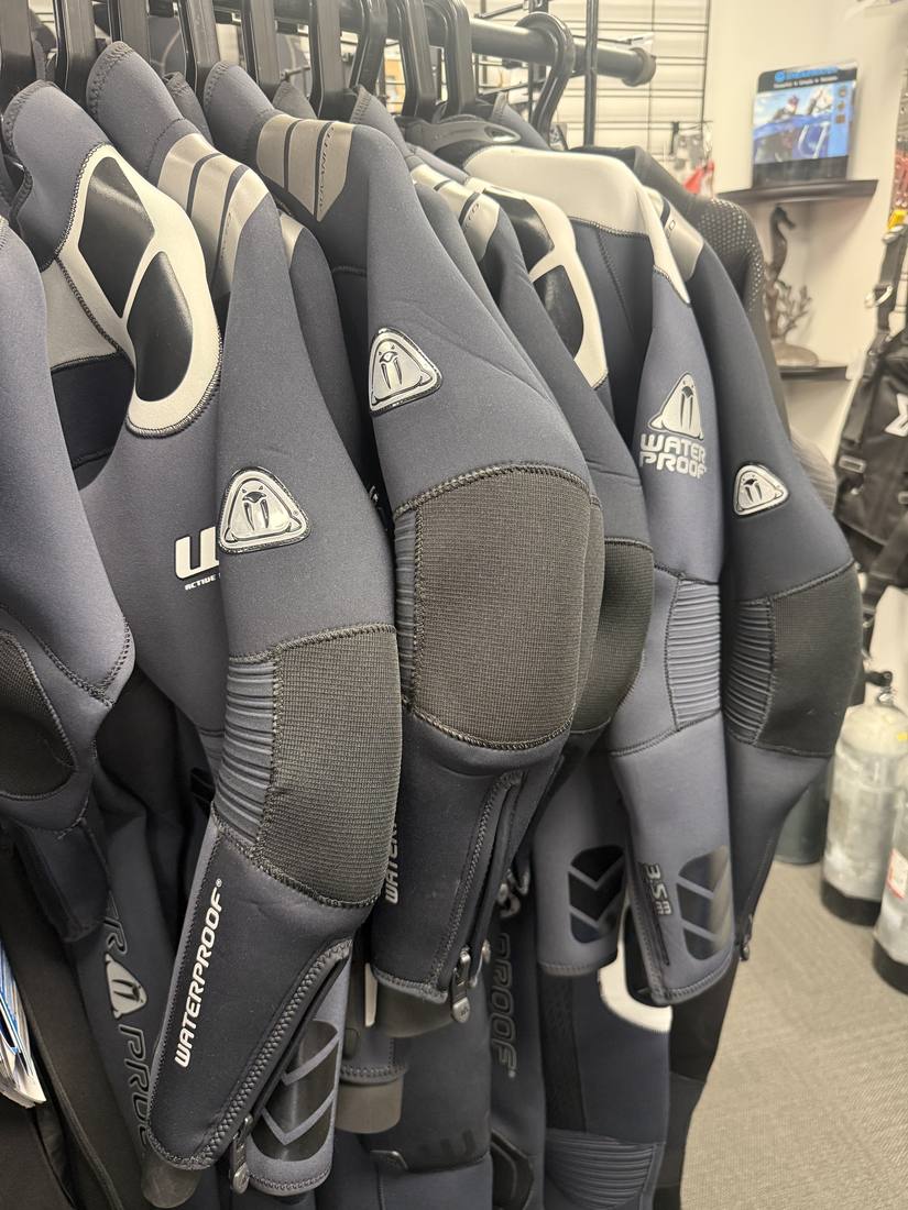 Waterproof wetsuits on the rack at Dive Arizona in Queen Creek, AZ