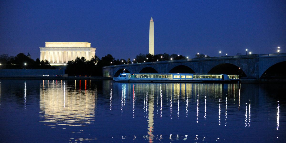 The Odyssey in front of DC monuments at night
