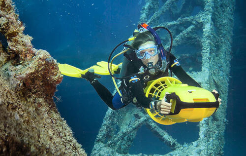 Diver using a diver propulsion vehicle