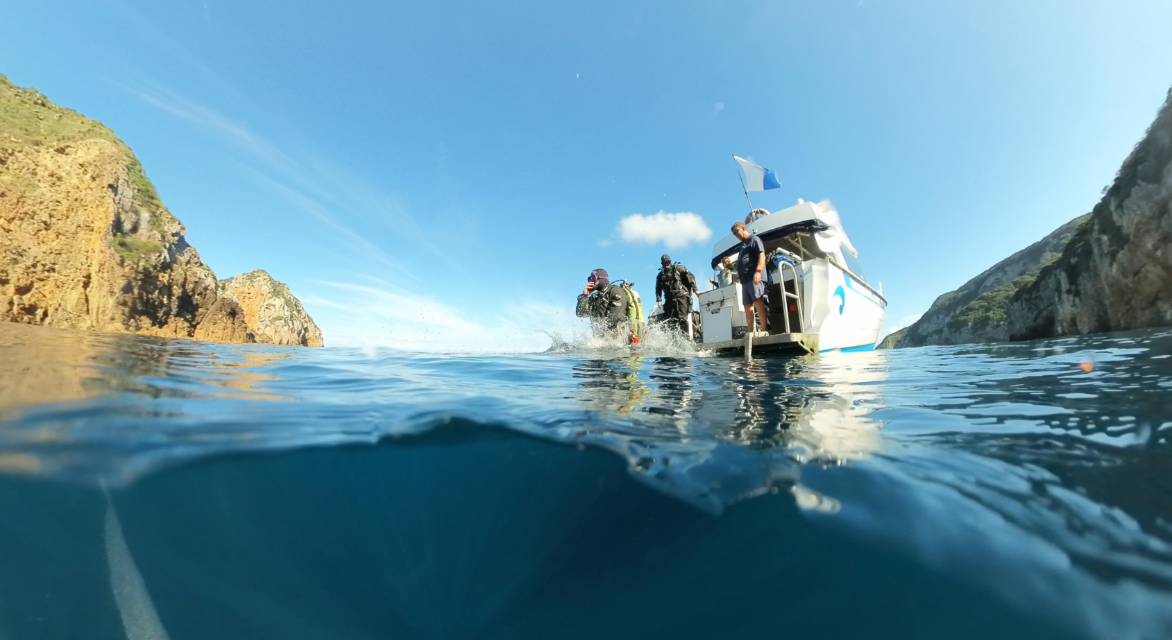 Diver ascending to the surface after a safety stop