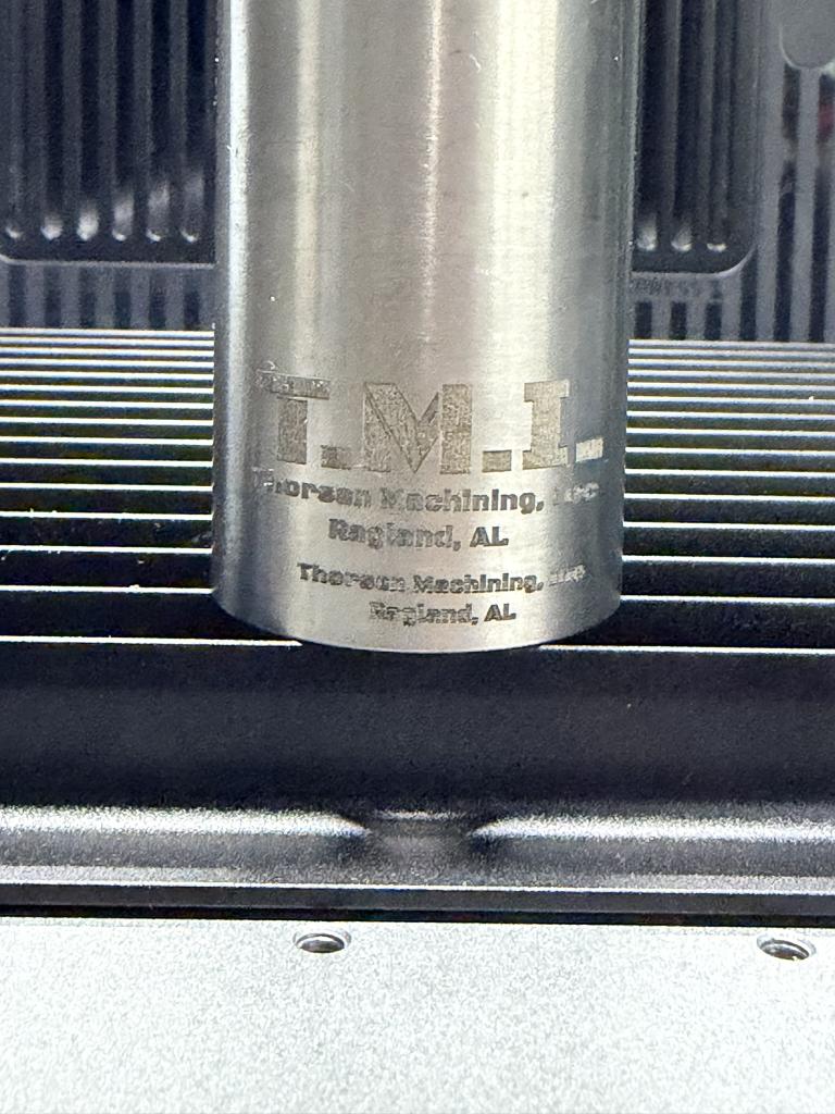 Custom ATF-compliant NFA marking laser engraved on a firearm barrel