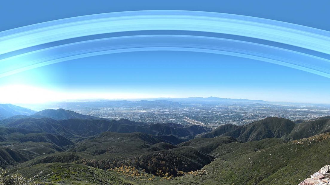 Los Angeles at 34 Degrees north sees the rings high in the sky. In this image the shadow of earth reflects on the rings at day.