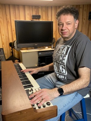 Jason Didner playing organ while recording Side Effects album