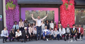 Designer Elie Balleh pose for the press with all is model