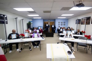 HWPL members and peace advocates hold up Peace Letters for President Putin