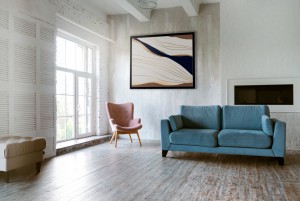 interior design with photoframes blue couch