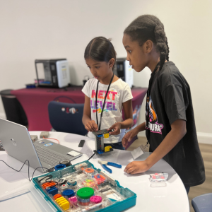 Students work with robots