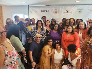 Artist Alvin Clayton-Fernandes with event guests