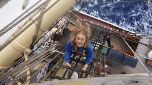 A+ World Academy Student climbing aloft