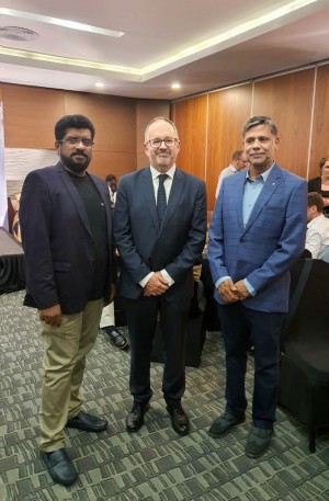 Mr. Robert Hale (center), Mr. Jam Nelavai (right) and Mr. Anubkumar (left)