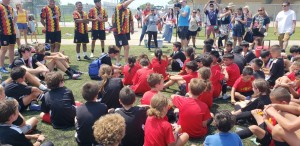 Antonio Soave and Leones Coaches speaking with Youth Campers on June 24, 2023