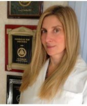 Anna V. Durkin, DDS, General & Implant Dentist with her Private Practice 