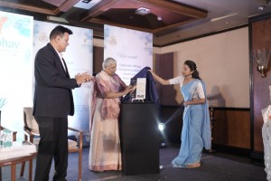 Mrs Ganga Swaroop Parvathiben Makkad and Mr Dhiraj Makkad unveiling the magazine