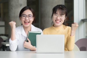Happy College Students at Homework Nest
